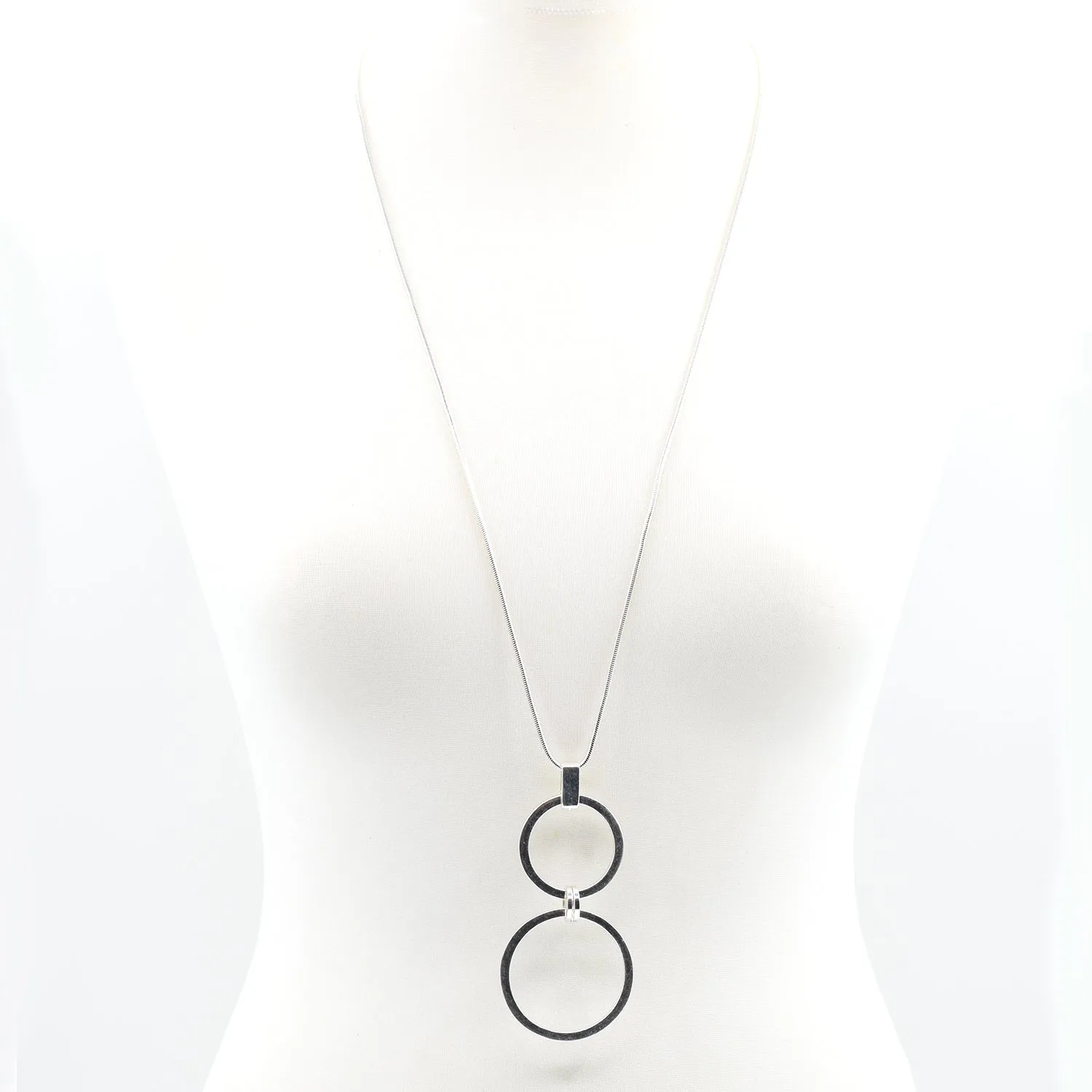 Cut out circle pendants on delicate beaded long chain