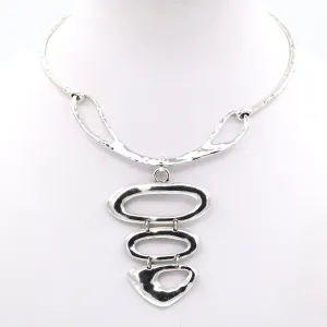Graduated organic pendants on collar style necklace