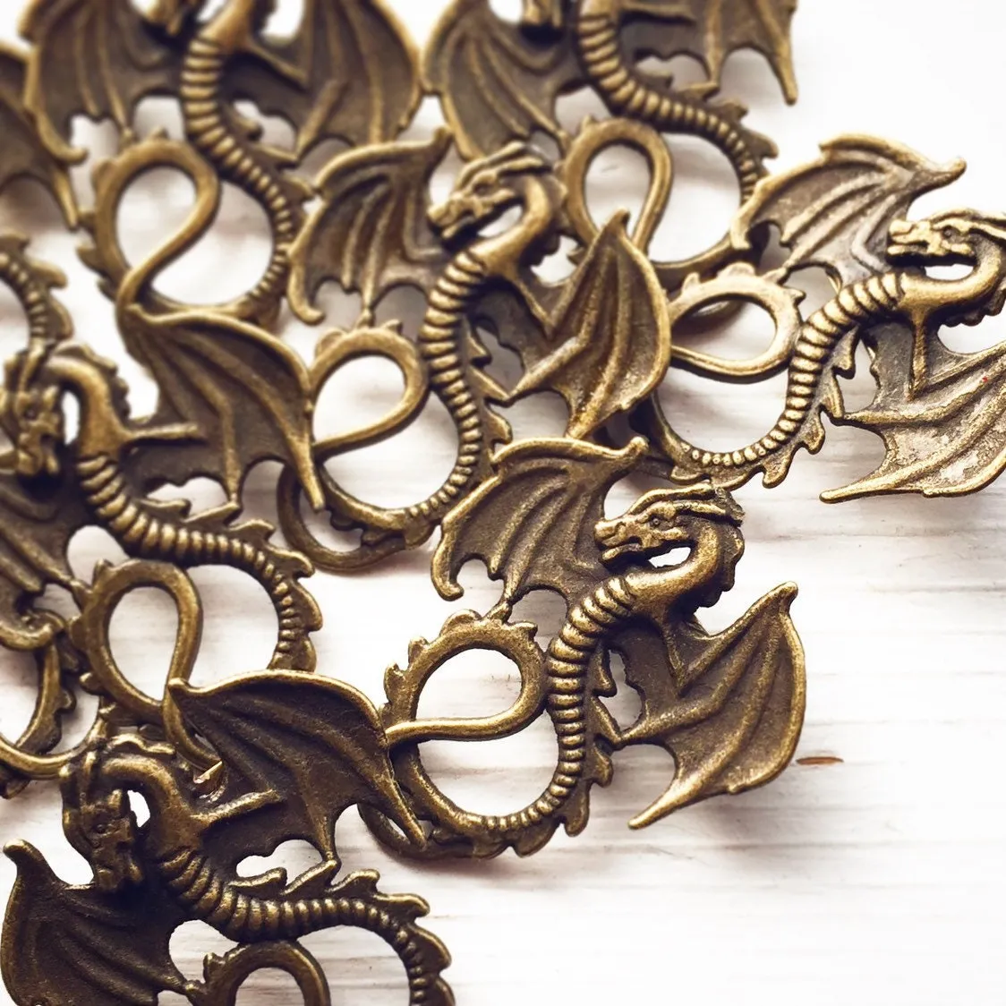 Pair of Dragon Brooches