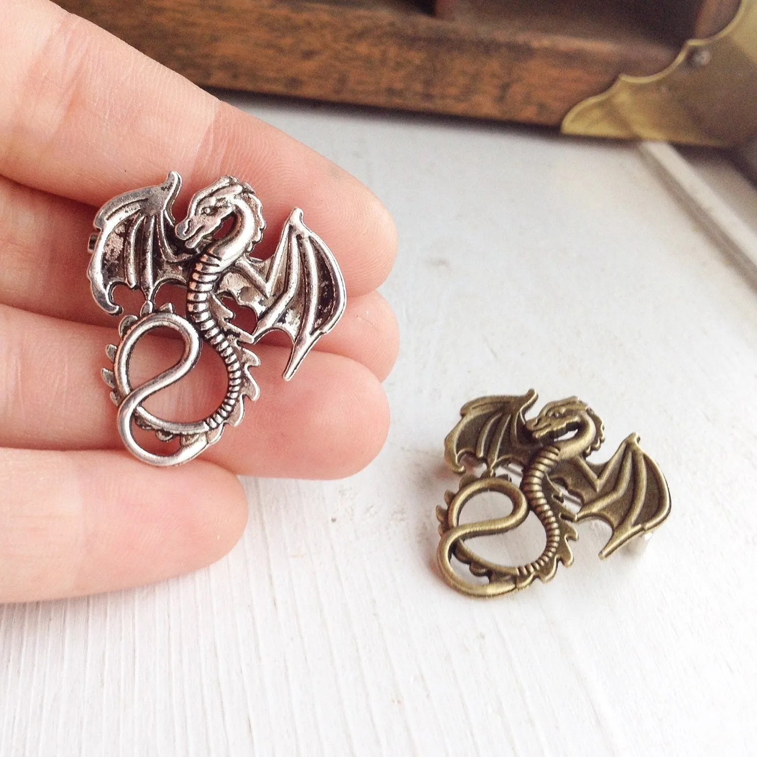 Pair of Dragon Brooches